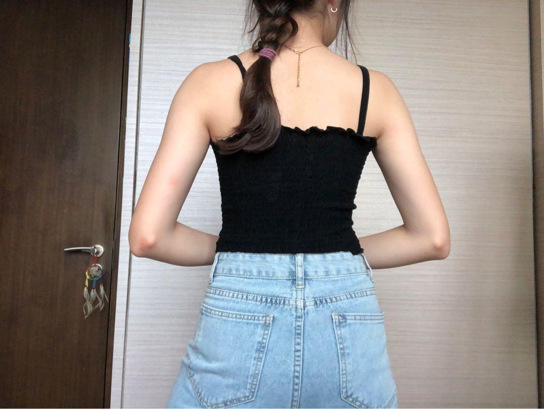 black basic tank (Category: Sleeveless) located in Singapore. Submitted by flaminclothin (Listing ID 1044050936, Image 2). Description: 🦋 it has a ruffled kinda materiall.