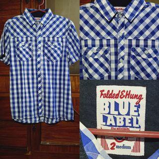 Folded & Hung Checkered Polo