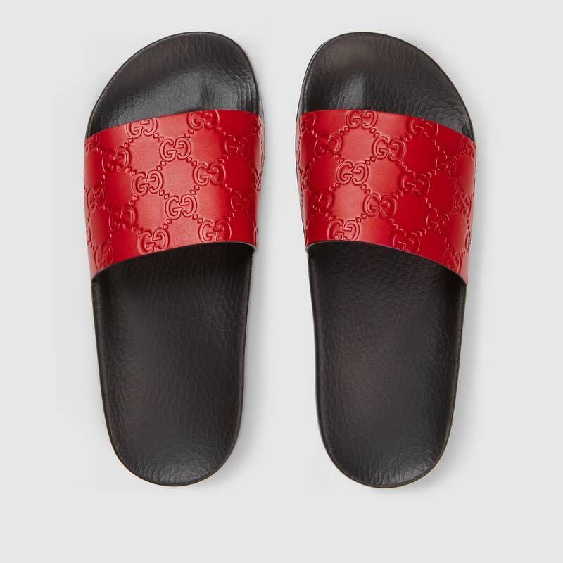 Gucci signature slide sandals in red 