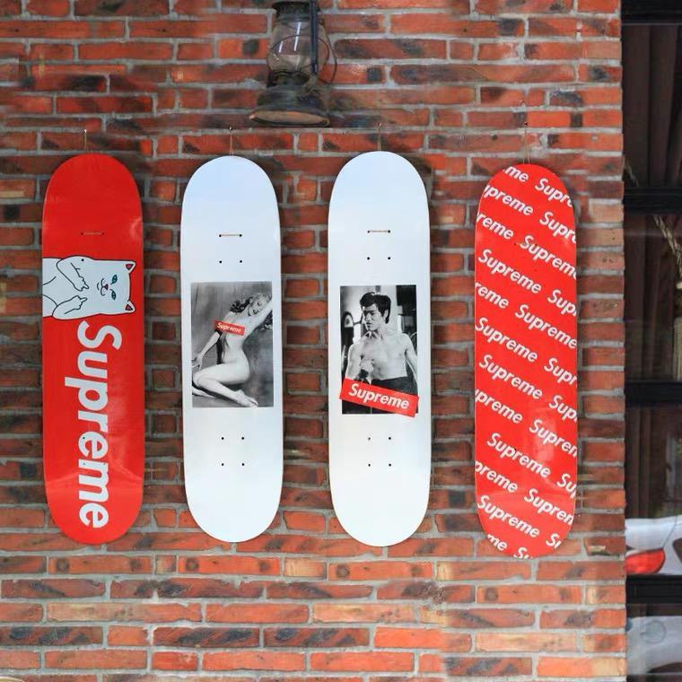 Supreme skateboard on wall shop