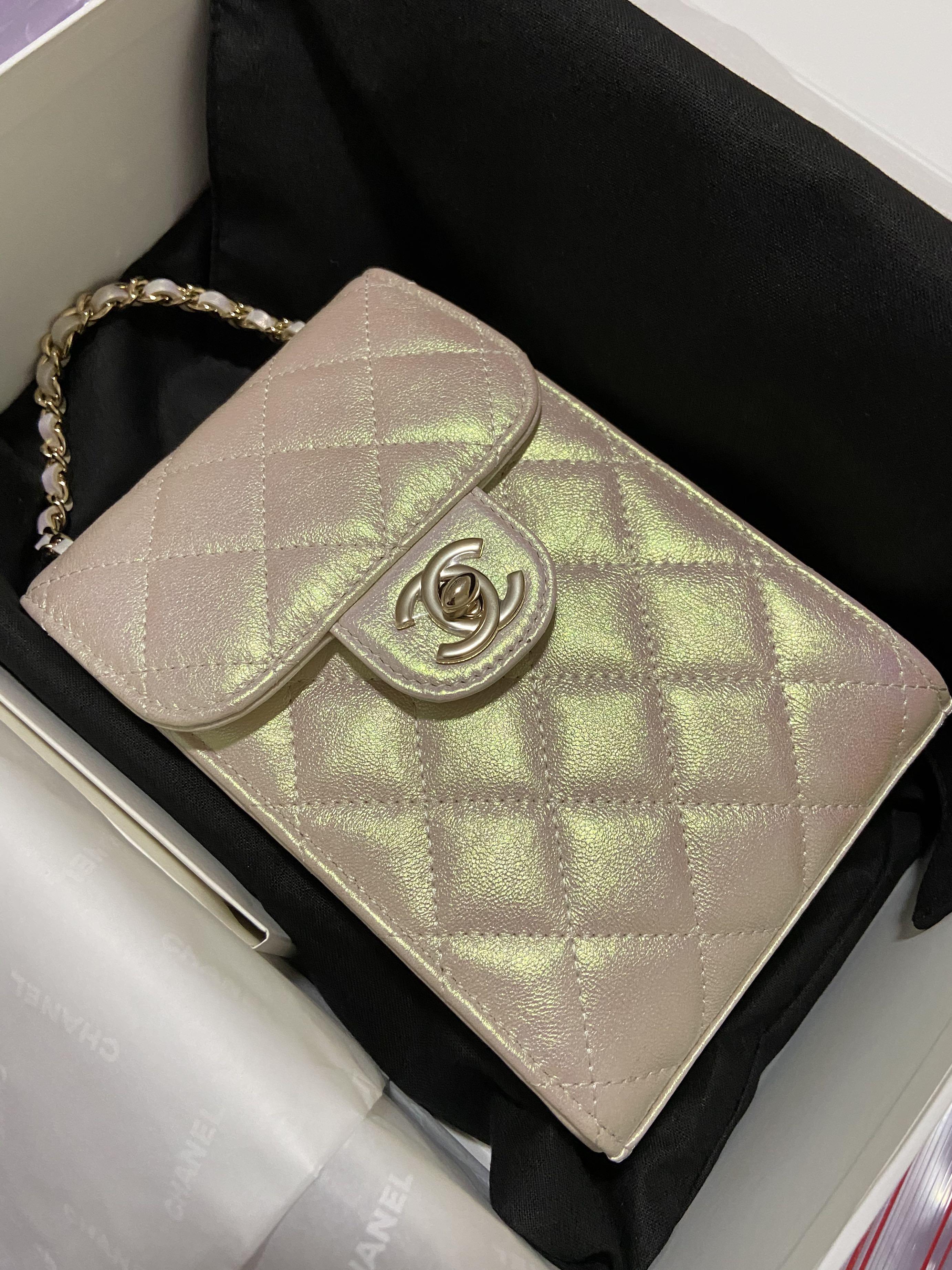 Rare 20K Chanel iridescent ivory pouch with chain 🌈 rare🌈, Luxury, Bags &  Wallets on Carousell