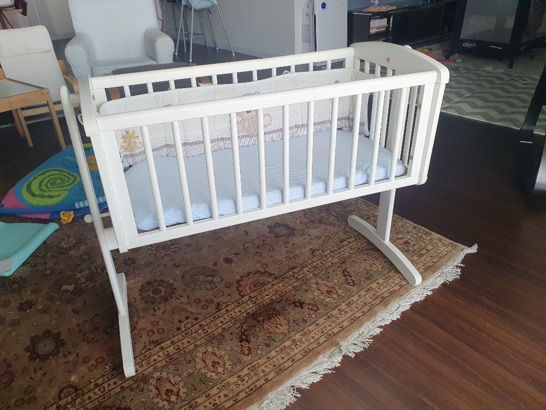 Swinging crib store mattress mothercare