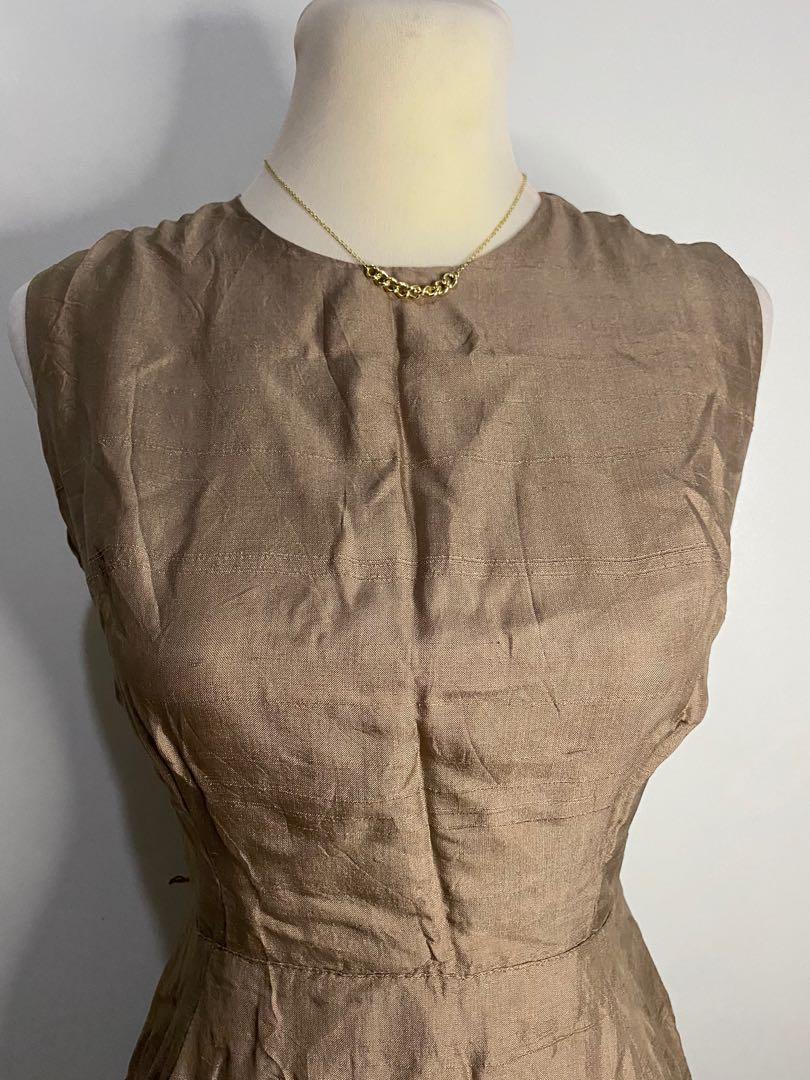 Brown formal dress (Category: Dresses) located in Taguig. Submitted by manilaessentials (Listing ID 1044510578, Image 3). Description: Can fit up to M bust- 26” to 27”.