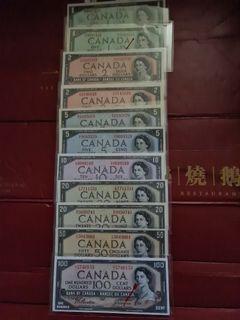 Canada  QEII 1954 set of $1 x4 all unc ,$2 unc &AU ,$5 x2 in AU and original  AU , $10 in unc , $20 x2 in unc and original Au and $50 in AU /unc and $100  unc pressed. .totak13 banknotes in a set , rare