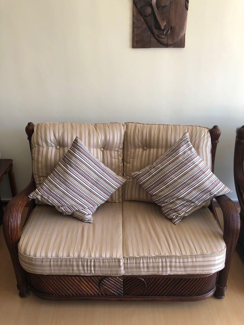 Cane Sofas set (Category: Sofas) located in Singapore. Submitted by peter16787 (Listing ID 1044440931, Image 3). Description: Sofa set consist with one glass top table, 2 sitters and 2x armchairs. Bought from Unicane years ago. Upholstery and new treatments was done by unicane factory 2 years ago. Self collect and price is negotiable..