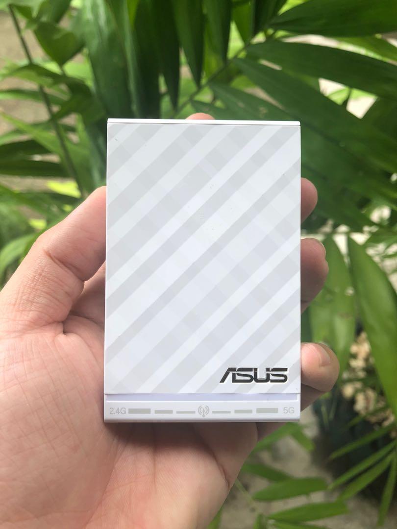 ASUS Dual Band Range Extender/Router (Category: Networking) located in Talisay. Submitted by prinzlu (Listing ID 1044663795, Image 2). Description: -Slightly Used -2.4ghz & 5.0ghz wifi RFS: Upgraded to Wifi Mesh System.