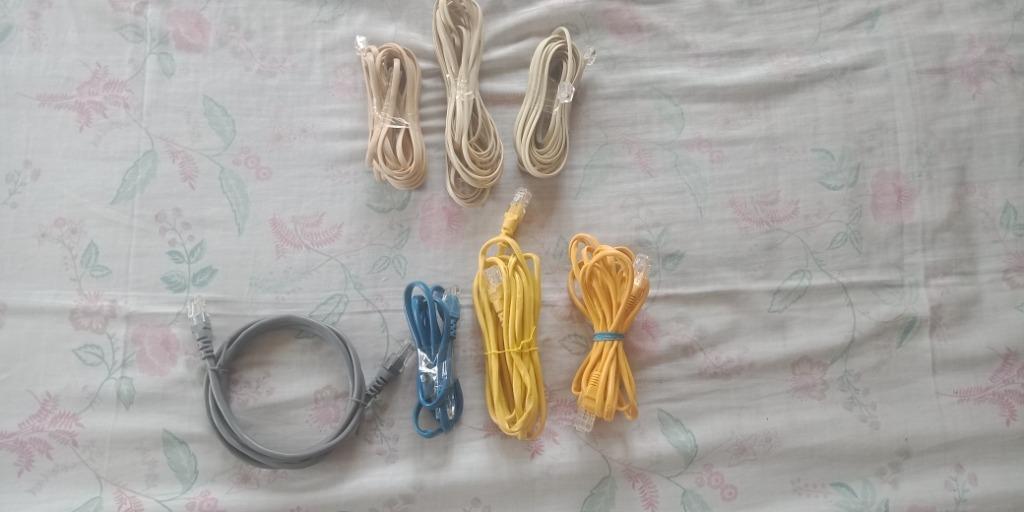 Ethernet and telephone cables (Category: Networking) located in Manila. Submitted by lockon2020 (Listing ID 1044682491, Image 1). Description: hindi ko poh alam kung gaano kahaba basta mahaba iyong telephone cord all for 100only.