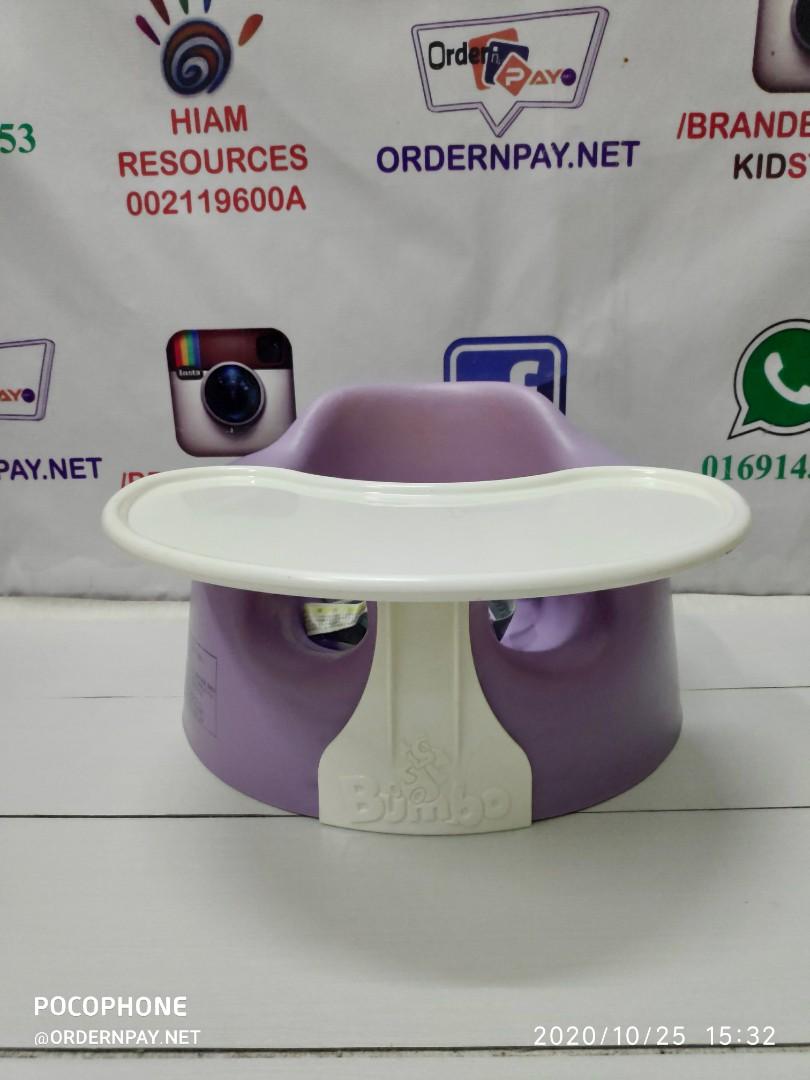 purple bumbo seat with tray