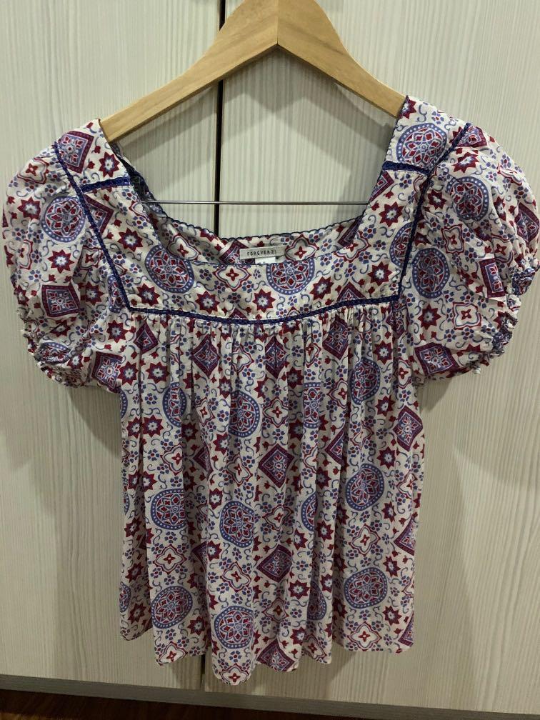 Forever 21 top (Category: Sleeveless) located in Muntinlupa City. Submitted by _preloveditems99 (Listing ID 1045025695, Image 1). Description: Used thrice. Good as new..