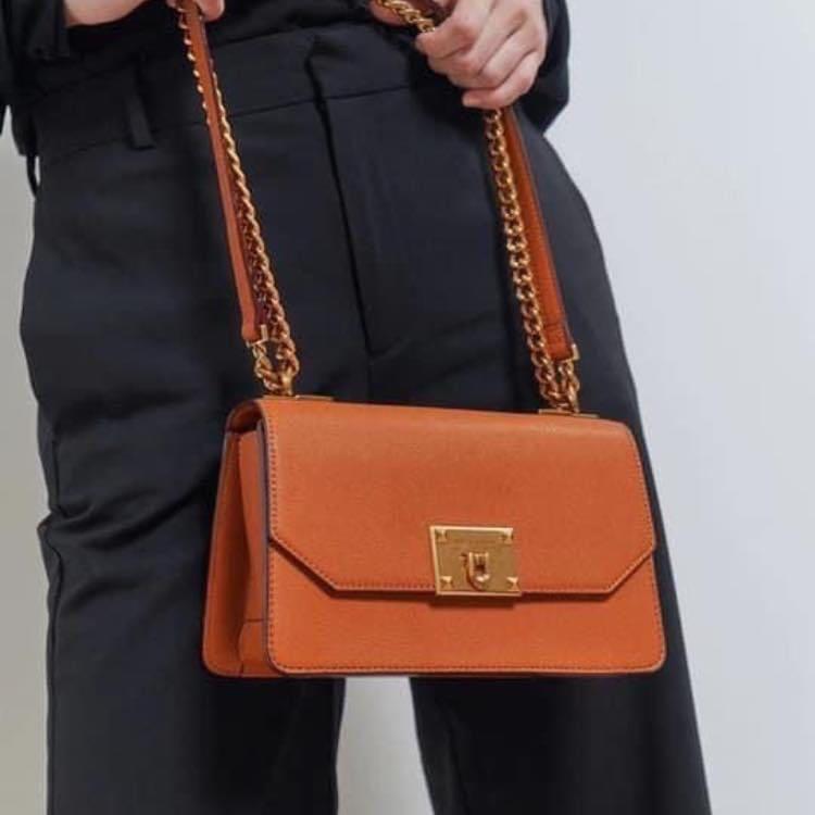 Metal push lock crossbody bag on sale