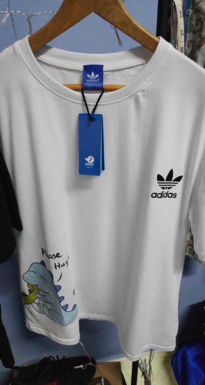 2Pcs Adidas Dinosaur Couple T Shirt (Oversized Cutting Style), Men'S  Fashion, Tops & Sets, Tshirts & Polo Shirts On Carousell