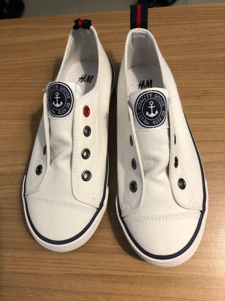 H M white canvas shoes