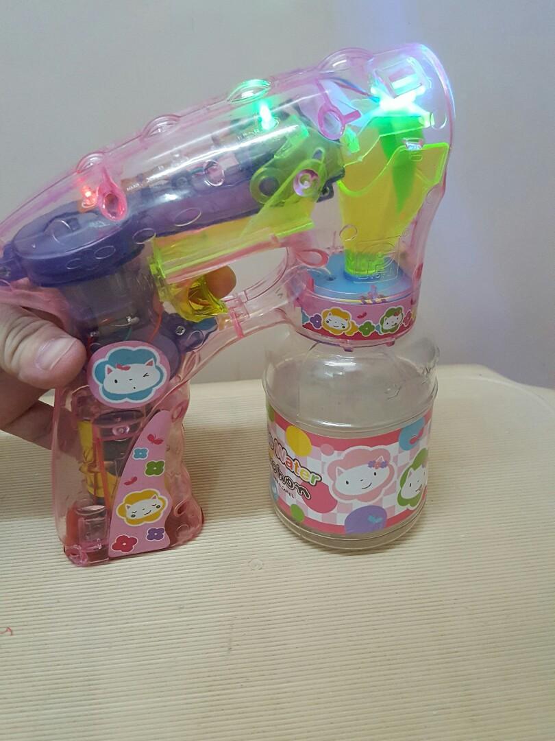 Bubble gun with light and sound (Category: Kids Toys) located in Manila. Submitted by sheldon_sun (Listing ID 1045470776, Image 2). Description: This is battery operated bubble gun it has sound and light..