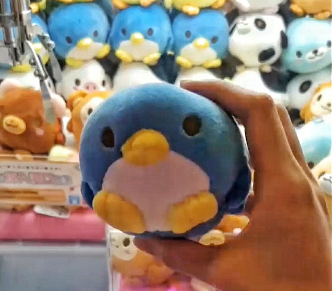 round penguin plush