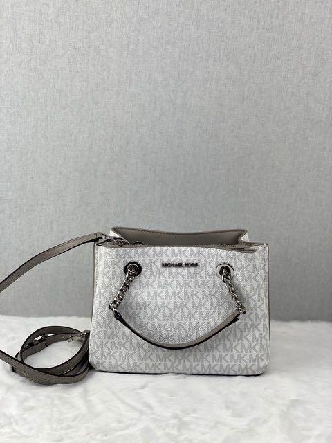 Michael kors teagen small messenger handbag hotsell crossbody in signature bright white