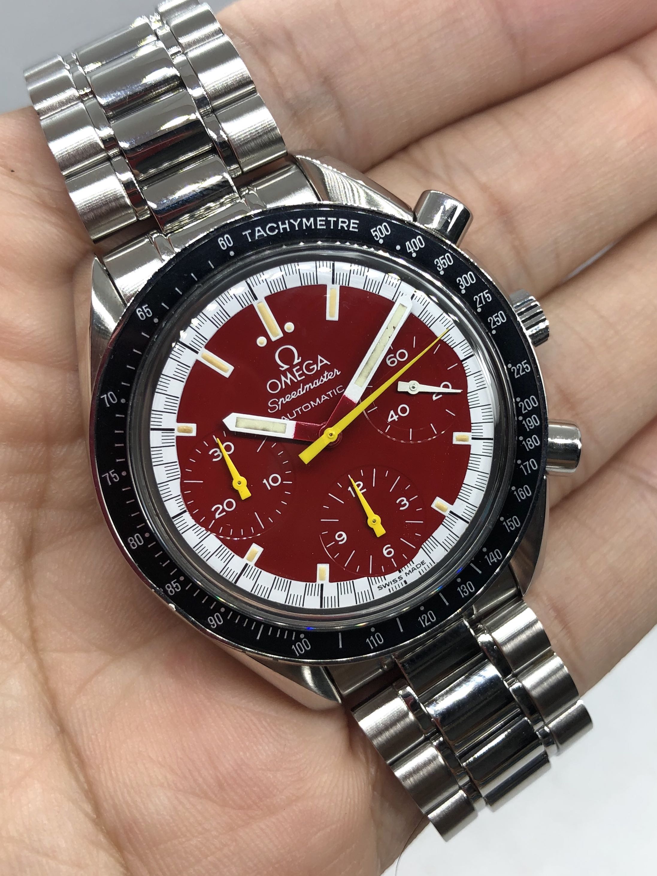 Omega speedmaster michael schumacher red sale