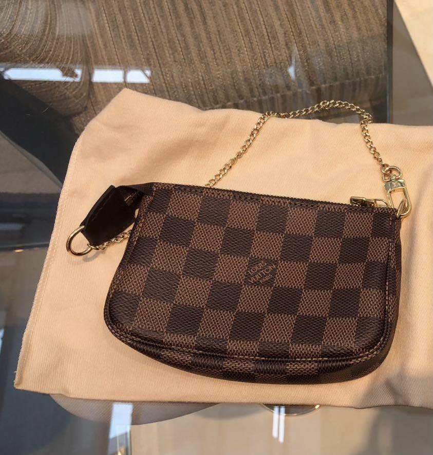 LV Mini Pochette Cluth brand new, Luxury, Bags & Wallets on Carousell