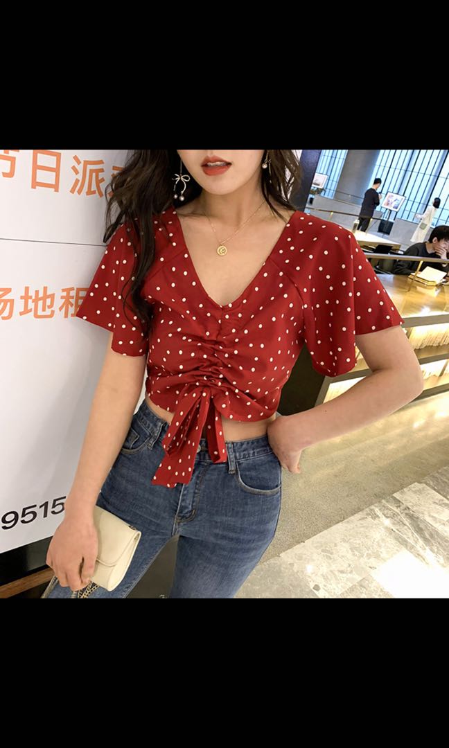 red polka dot top