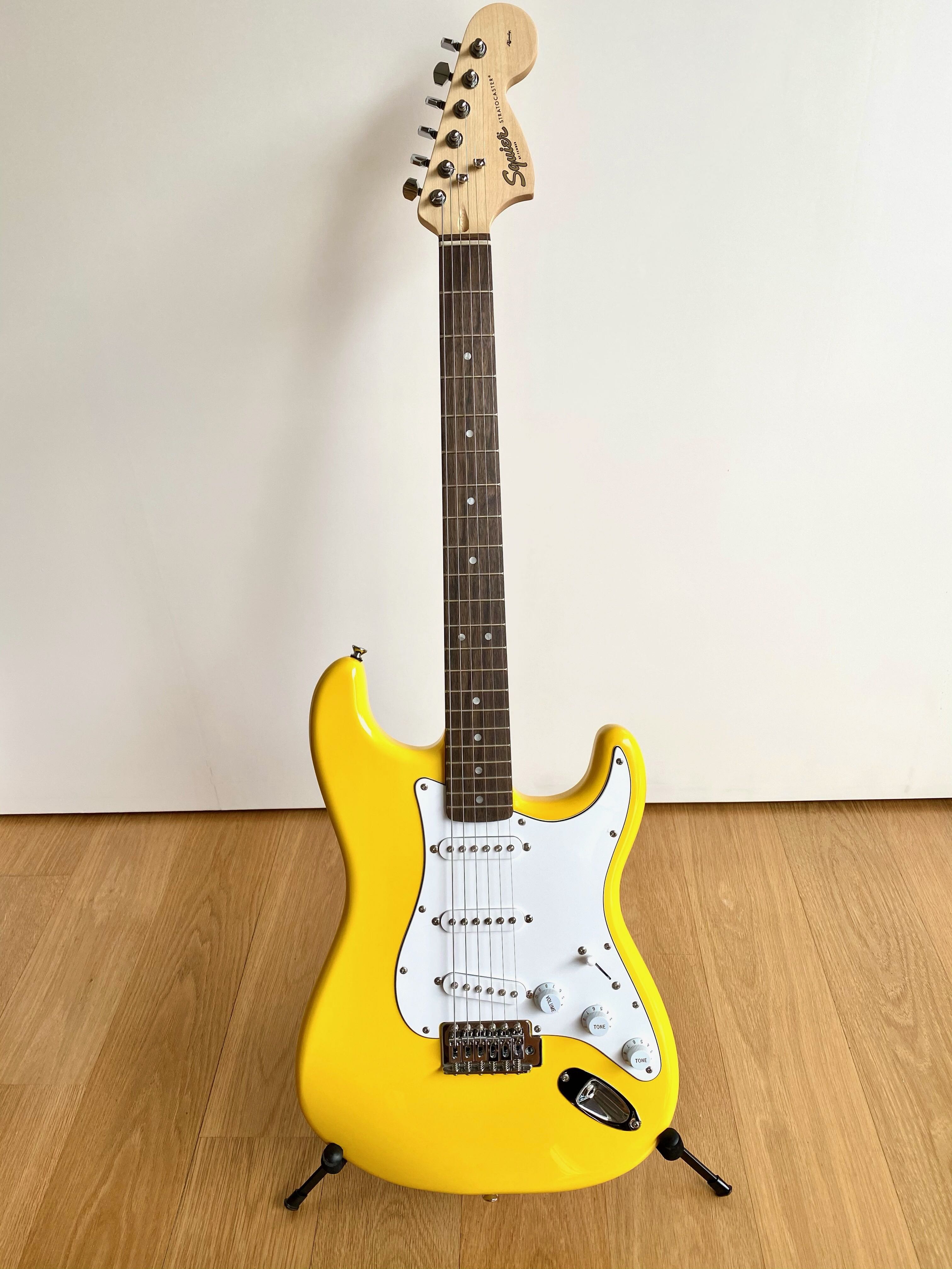 Yellow deals squier stratocaster