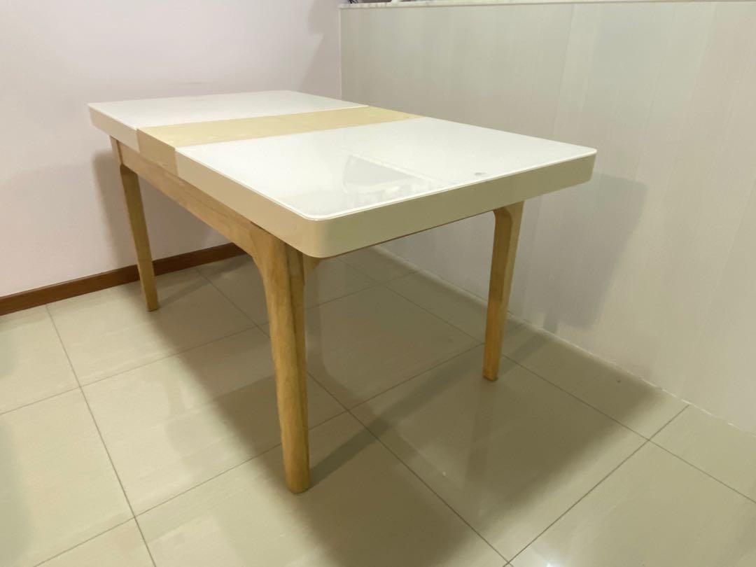 Dining Table (Extendable) (Category: Tables & Sets) located in Singapore. Submitted by meitingwa (Listing ID 1045826699, Image 3). Description: Dining Table L120, W80, H75, extendable to L150 with pull-out wooden panel built-in. Tempered glass table surface, Solid Wood structure & legs, Scandinavian or Minimalist design! Original price $599 Cash on Self-collect or delivery arranged by buyer..