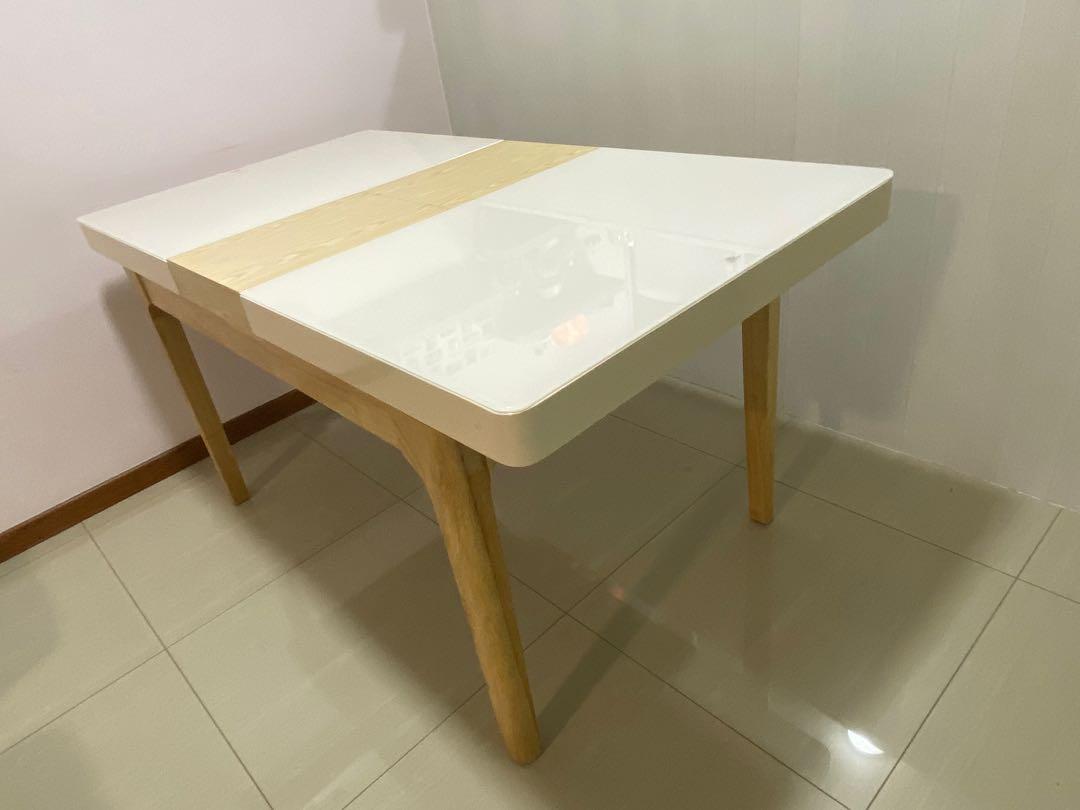 Dining Table (Extendable) (Category: Tables & Sets) located in Singapore. Submitted by meitingwa (Listing ID 1045826699, Image 2). Description: Dining Table L120, W80, H75, extendable to L150 with pull-out wooden panel built-in. Tempered glass table surface, Solid Wood structure & legs, Scandinavian or Minimalist design! Original price $599 Cash on Self-collect or delivery arranged by buyer..