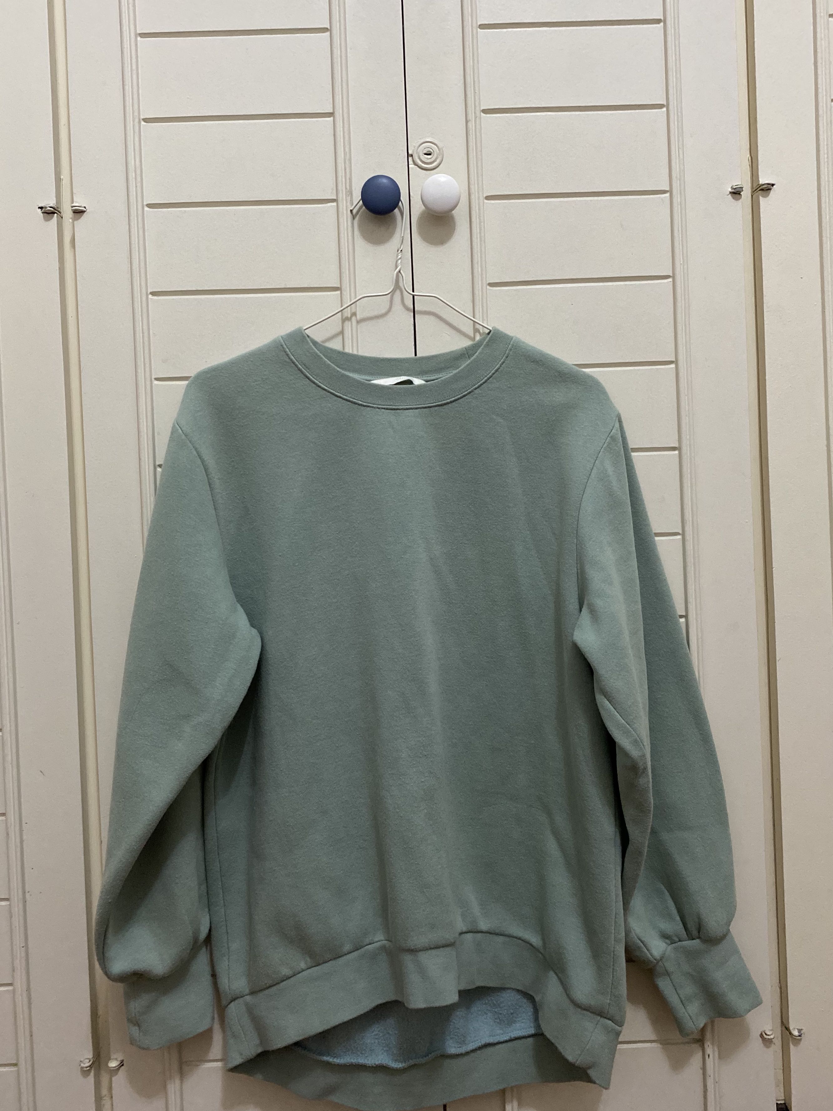 mint green sweatshirt