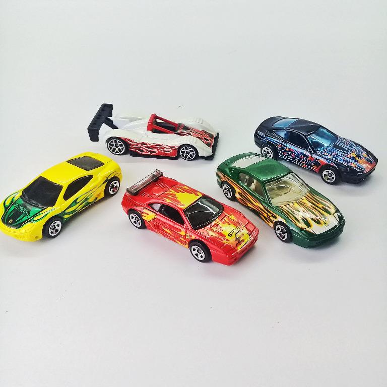 Hotwheels Ferrari Heat Series (2004) (Category: Vehicle & Diecast Models) located in Las Pinas. Submitted by yanniyuan (Listing ID 1045872320, Image 1). Description: PLEASE READ. Selling my pre-loved hotwheels collection. Sold as is. Never been played. Opened for inspection only and kept and covered with tissue paper on plastic container (jammers case) ever since. Green one's paint is slightly dull esp on the roof part but doesn't affect display 