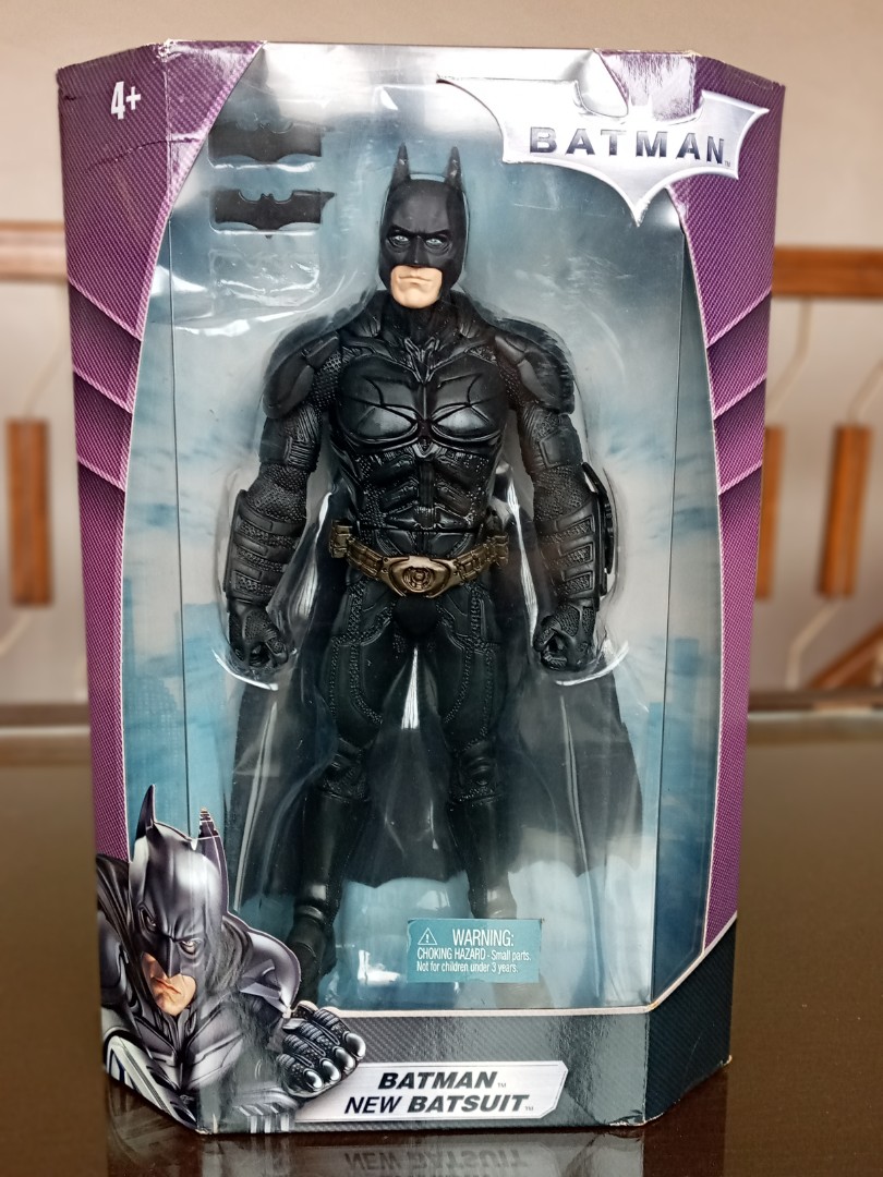 Christian bale deals batman figure