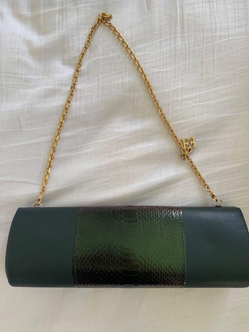 ESCADA CLUTCH (Category: Luxury Bags & Wallets) located in Angeles City. Submitted by closet_envyy (Listing ID 1039280232, Image 1). Description: Escada green leather and snakeskin clutch Pm pls for more photos .