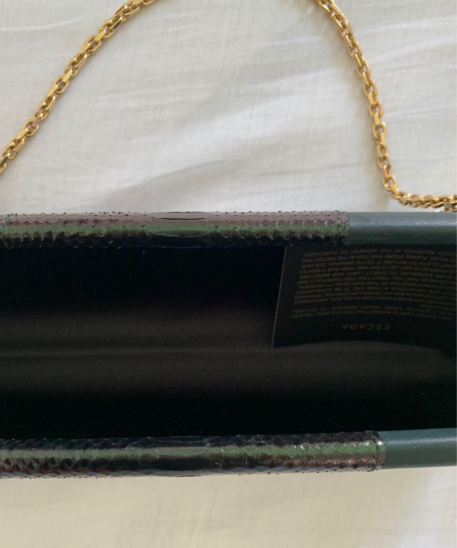 ESCADA CLUTCH (Category: Luxury Bags & Wallets) located in Angeles City. Submitted by closet_envyy (Listing ID 1039280232, Image 2). Description: Escada green leather and snakeskin clutch Pm pls for more photos .