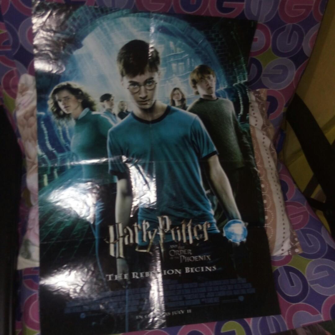 Harry potter collectibles (Category: Western Merchandise) located in Makati City. Submitted by cd910625 (Listing ID 1039345030, Image 3). Description: harry potter collectibles. 1 coin album with several coins. panini sticker album with 4 stickers sticked inside and 1 back to back movie poster..