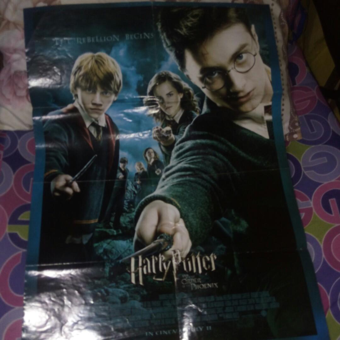 Harry potter collectibles (Category: Western Merchandise) located in Makati City. Submitted by cd910625 (Listing ID 1039345030, Image 2). Description: harry potter collectibles. 1 coin album with several coins. panini sticker album with 4 stickers sticked inside and 1 back to back movie poster..