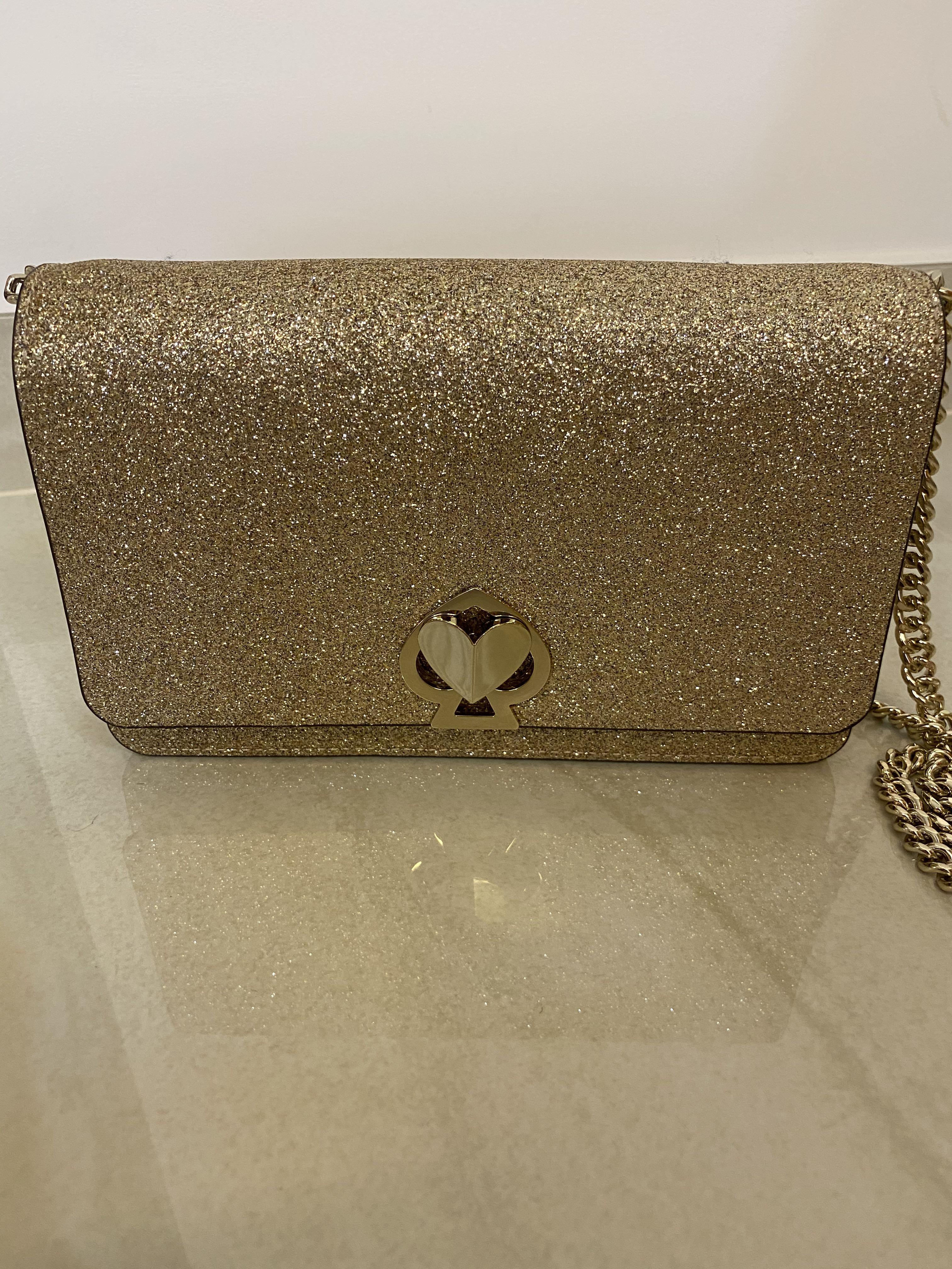 Kate Spade nicola shimmer twistlock chain wallet (Gold), Women's Fashion,  Bags & Wallets, Cross-body Bags on Carousell