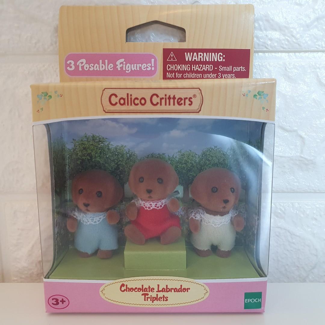 Calico critters store chocolate labrador family