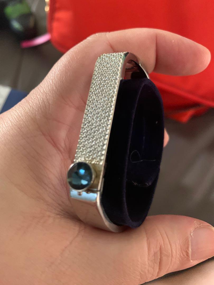 Swarovski silver cuff with amethyst gem size Medium with box and tags (Category: Luxury Accessories) located in Antipolo. Submitted by munstershupper (Listing ID 1039576069, Image 2). Description: Got this as a gift last 2018. Brand new unused. My tita bought this at Macy’s.