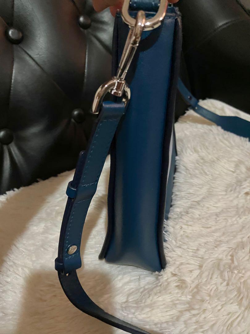 Michael Kors Sling Bag (Category: Luxury Bags & Wallets) located in Paranaque City. Submitted by cher_ami (Listing ID 1039690861, Image 3). Description: Unused Michael Kors sling bag 💯% Authentic 9.5”X 2.5”X8.5” Bought from the US No flaws Bag only *NO RETURN. NO EXCHANGE please ask questions for more details Thank you.