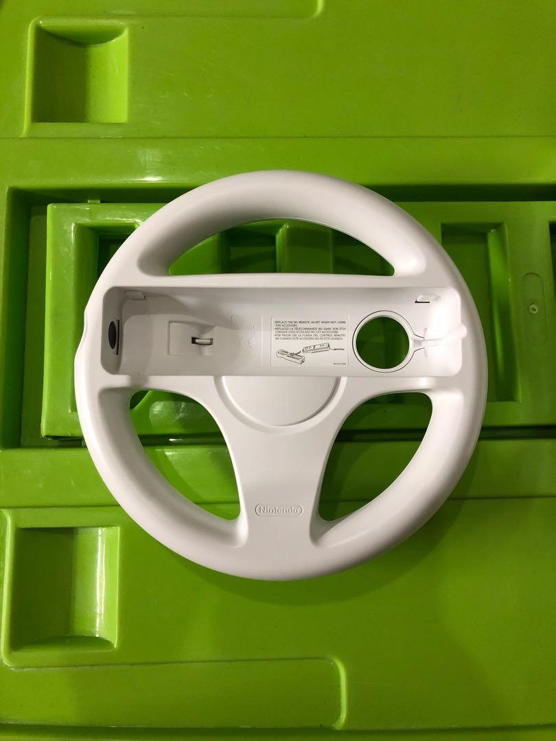 Nintendo Wii Wheel (Category: Controllers) located in Mandaluyong City. Submitted by bonibuys (Listing ID 1039728377, Image 1). Description: Nintendo Wii Wheel Color: White Opened just to test complete with box PHP500.00 + delivery fee Rfs: decluttering.