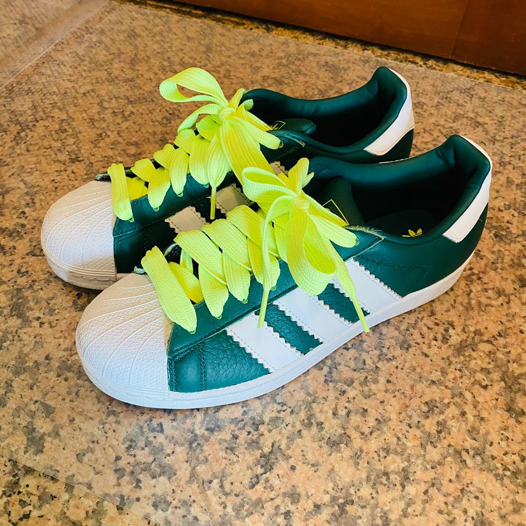 lime green and navy blue adidas shoes