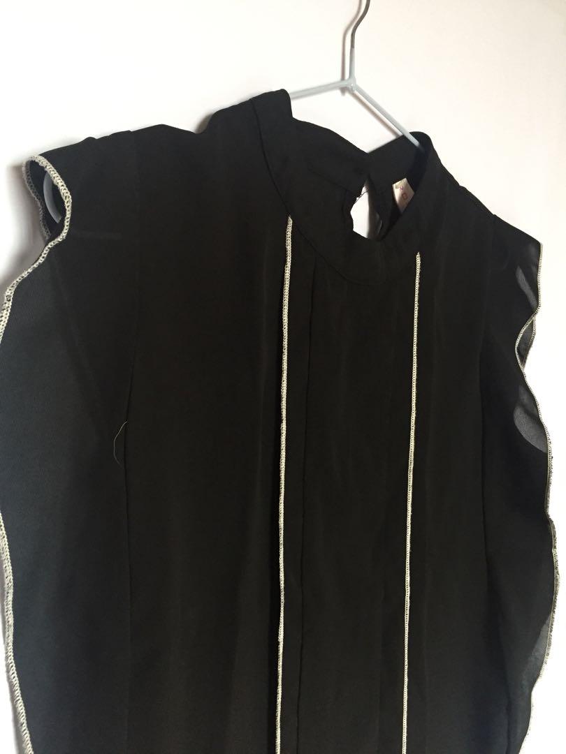 Black Formal Ruffled Top (Category: Sleeveless) located in Manila. Submitted by toothless.project (Listing ID 1040064591, Image 2). Description: Best Fit to Med-Semi L💙 Perfect for your TIMELESS SMART CASUAL LOOK. BARELY USED and DEFINITELY NOT ABUSED! 👌🏻 .