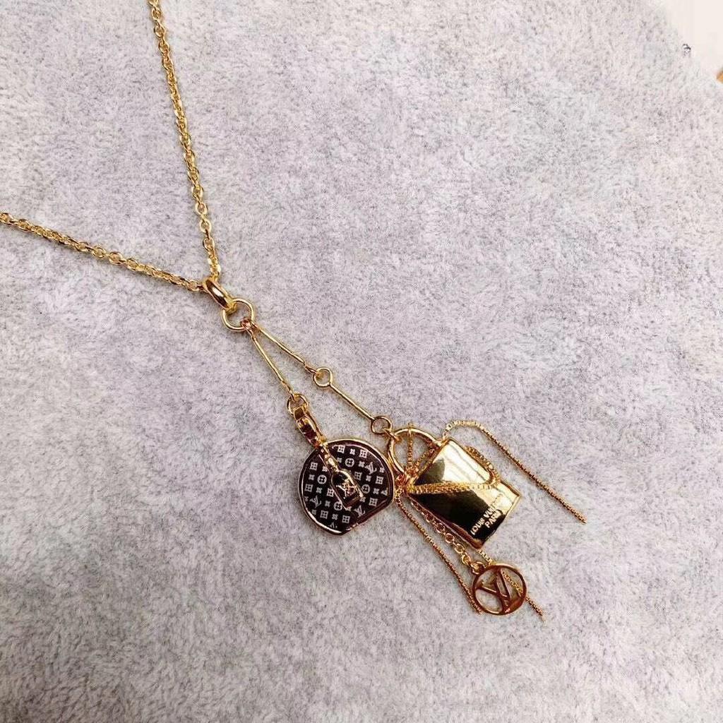 Louis Vuitton Mismatched Necklace (Category: Luxury Accessories) located in Rizal. Submitted by gentlemonsterph (Listing ID 1040059446, Image 3). Description: Louis Vuitton Monogram Mismatched Necklace ✨ Whimsical yet refined, these Mini LV Mismatched Necklace fulfil the recent trend for non-matching necklace. In homage to the House's historic designs, the attached charms are fashioned from iconic Monogram canvas and gold-colour metal. The influe