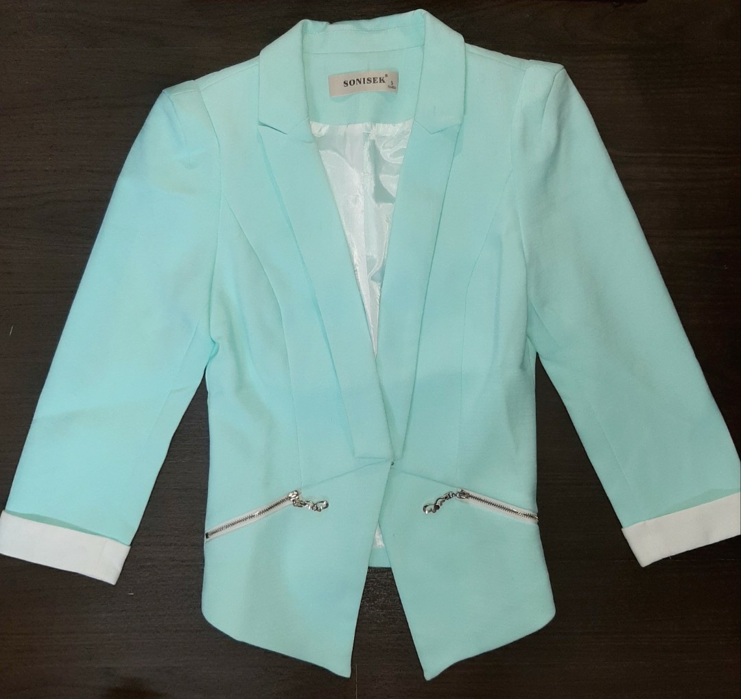 mint green coat
