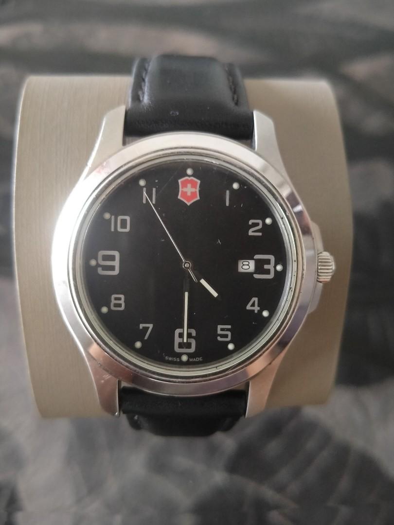 Victorinox garrison elegance black dial leather strap men's deals watch 26052cb
