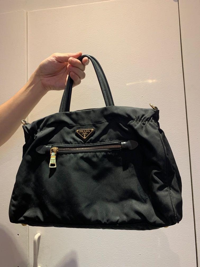 Prada Nylon Tessuto saffian black bag (Category: Luxury Bags & Wallets) located in Makati City. Submitted by dripa (Listing ID 1040464468, Image 2). Description: 💯 Authentic prada Bag -dust bag - original leather strap -authenticity card Perfect for errands and work bag . Rfs: need smaller bag.