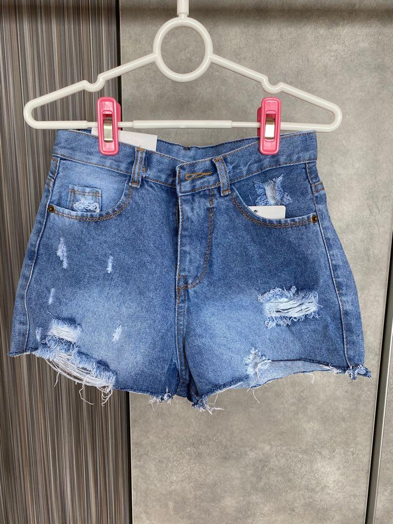 ripped blue jean shorts