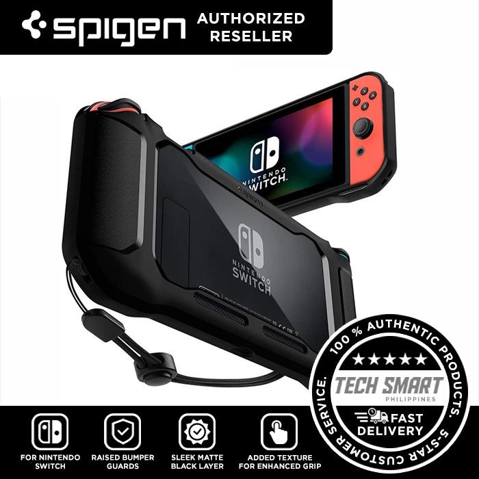 Spigen Rugged Armor Case for Nintendo Switch (Category: Cases & Covers) located in Manila. Submitted by techsmartph (Listing ID 1040507651, Image 1). Description: * Sleek and timeless matte black layer with raised bumper guards * Added texture around control stations for enhanced grip * Transparent back shows off the original color of Nintendo Switch * Includes a hand strap for a more controlled and drop-free experience * Only compatible with Nin