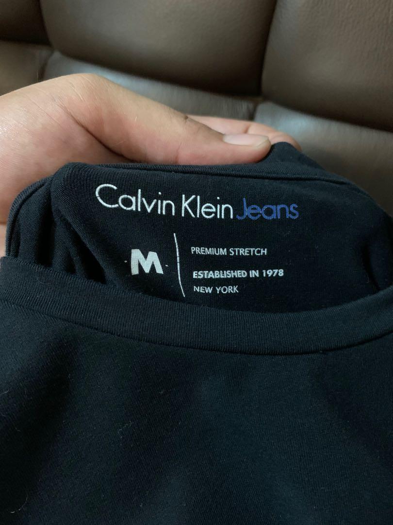 Calvin Klein Jeans T-shirt, Men's Fashion, Tops & Sets, Tshirts & Polo  Shirts on Carousell