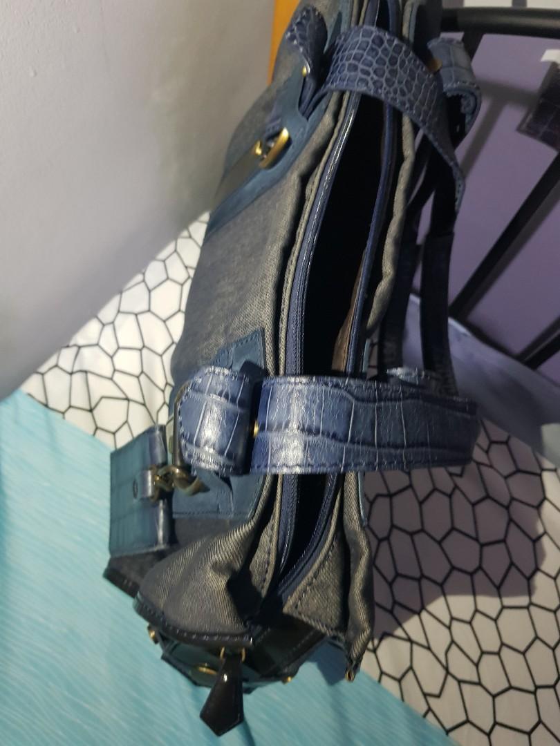 Guaranteed Authentic Lancel Denim Shoulder Bag (Category: Luxury Bags & Wallets) located in Paranaque City. Submitted by rizasauthenticitems (Listing ID 1046107118, Image 3). Description: Guaranteed Authentic Lancel Denim Shoulder Bag can be used as laptop bag Croc Leather, old gold hardware with tag Rank A condition can fit 12 to 15 inches laptop.