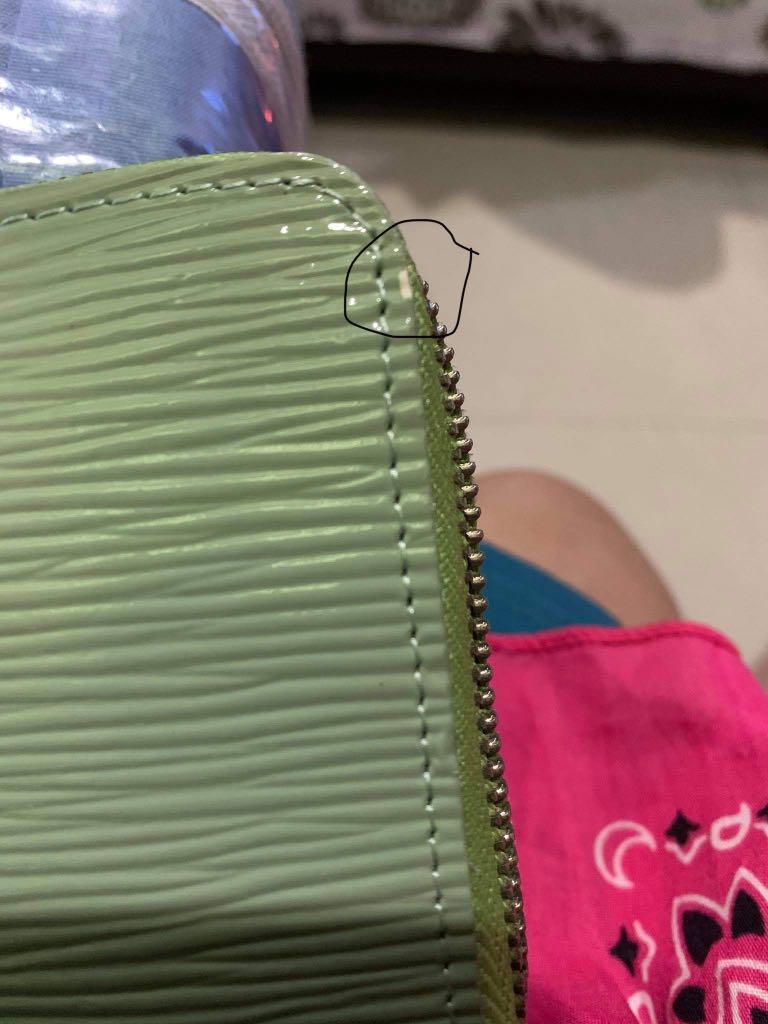 LOUIS VUITTON Epi Wallet (Category: Luxury Bags & Wallets) located in Caloocan City. Submitted by rtariman (Listing ID 1046001496, Image 3). Description: Pre-loved LOUIS VUITTON Epi Wallet With minimal flaws - see last 2 pictures Negotiable.