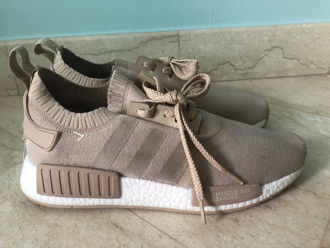 Nmd la marque deals aux 3 bandes