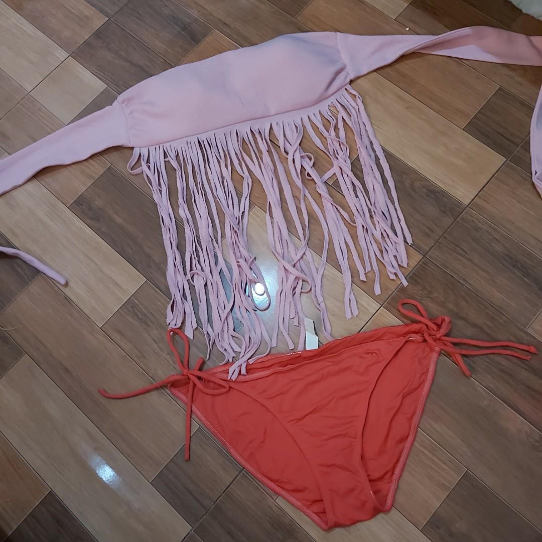 3 ways to wear two piece swimsyit (Category: Bikinis & Swimsuits) located in Quezon City. Submitted by cheverloo (Listing ID 1048110645, Image 2). Description: S-M, padded.3 ways to wear top. good as new. rfs:declutter. tumaba na.😂 msg me! bpi only! #swimsuit #swimwear #sweldosale #1111 #sale #preloved #bikini #bikinitop #twopiece #onepiece #romper #summerwear.